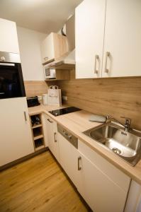 Cucina o angolo cottura di Appartement THE GOOD VIEW by All in One Apartments