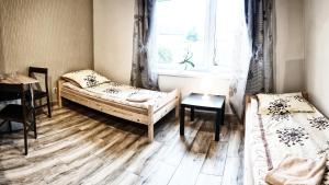 Łóżko lub łóżka w pokoju w obiekcie Villa 106