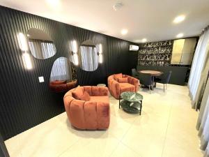 אזור ישיבה ב-Glamping con jacuzzi en piso 15, único en Gdl, vistas espectactaculares