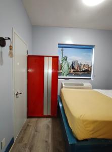 Postel nebo postele na pokoji v ubytování Essence hotel