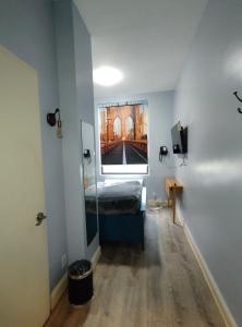 Postel nebo postele na pokoji v ubytování Essence hotel