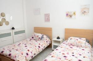 Ένα ή περισσότερα κρεβάτια σε δωμάτιο στο Apt. ManRey 2A - Turquesa