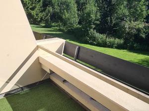 a bench on the side of a building at Urlaub in Bayerischen Wald in Sankt Englmar