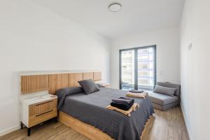 Postel nebo postele na pokoji v ubytování Modern condo Praia da Rocha,Terracos Da Ciudade + 21 fotografií