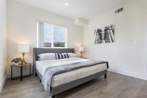 Voodi või voodid majutusasutuse Stylish Dtla Home With Views toas