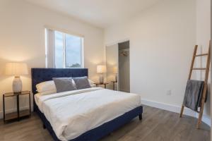 Voodi või voodid majutusasutuse Stylish Dtla Home With Views toas