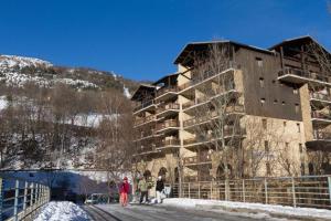 a group of people standing in front of a building at Signal du Prorel Briançon Serre Chevalier "QOCLICO" in Briançon