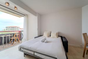 Una cama o camas en una habitación de Atlantic Selection - Vue Océan - La Sud Hossegor