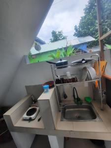 Kuchyň nebo kuchyňský kout v ubytování 1308 Siargao General Luna