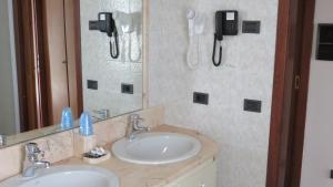 Vannituba majutusasutuses Albergo Al Cacciatore