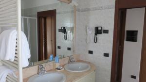 Vannituba majutusasutuses Albergo Al Cacciatore