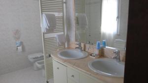 Vannituba majutusasutuses Albergo Al Cacciatore