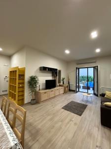 TV a/nebo společenská místnost v ubytování Paradise House