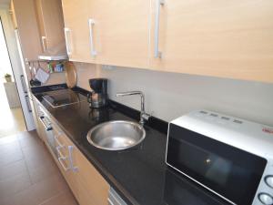 Kuchyň nebo kuchyňský kout v ubytování Apartment with pool in Orihuela + 32 fotografií