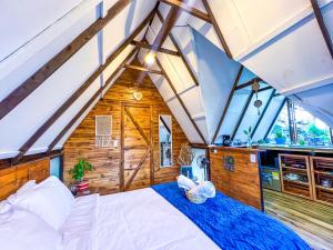 Glamping Chalet Deluxe cerca al centro de Villa de Leyva - By Serena Morena客房内的一张或多张床位
