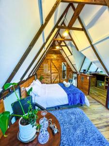 Glamping Chalet Deluxe cerca al centro de Villa de Leyva - By Serena Morena客房内的一张或多张床位