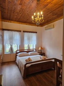 Postel nebo postele na pokoji v ubytování Amalia's House
