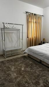 Letto o letti in una camera di Qantab Village Stay