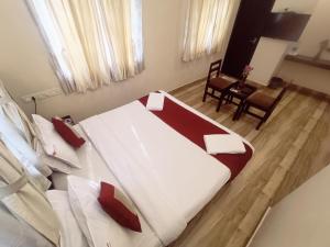 Postel nebo postele na pokoji v ubytování Hotel Marys Arcade