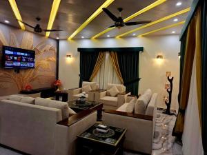 Et opholdsområde på Royal Galaxy Hotel & Residence Islamabad