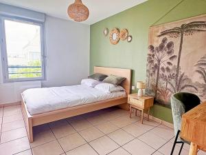 Ένα ή περισσότερα κρεβάτια σε δωμάτιο στο Charmant T2 terrasse, garage +4 φωτογραφίες
