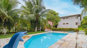 Πισίνα στο ή κοντά στο Casa espaçosa no Prive Baia do Cupe