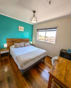 Cama ou camas em um quarto em Hostal Terraza Recreo