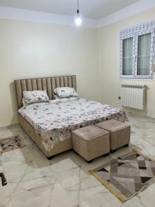 Una cama o camas en una habitación de Loft19