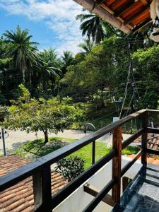 a view from the balcony of a resort at Pousada Horizonte in Ilha de Boipeba