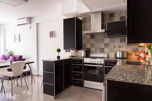 Nhà bếp/bếp nhỏ tại MG Baires - Dos ambientes 1C en Alquiler Temporario en Buenos Aires