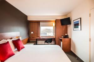 Postel nebo postele na pokoji v ubytování Ibis Christchurch