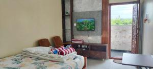 a room with a bed with american flags on it at Archana palace hampi in Hampi +64 photos