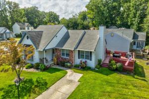 an image of a house with a yard at A Shore Thing - Spacious House w Large Deck, BBQ, Linens & Pet Friendly in North Cape May