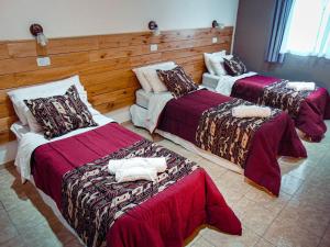 Constantino Hostel by lo de Guilleにあるベッド