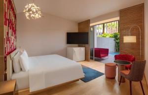 Postel nebo postele na pokoji v ubytování W Singapore - Sentosa Cove + 131 fotografií