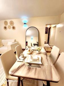 Posezení v ubytování Modern 2 Bedroomed Apartment + 4 fotografie