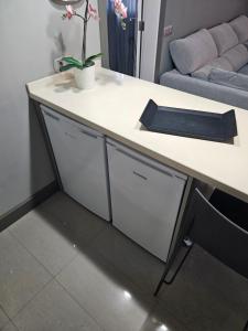 a desk with two drawers in a living room at Atalaya 2 Sea View - Puerto del Carmen in Tías