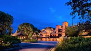 a large house with a road in front of it at Disney's Animal Kingdom Lodge in Orlando