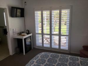 Postel nebo postele na pokoji v ubytování Pa Road B&B Kerikeri NZ