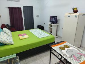 TV a/nebo společenská místnost v ubytování Adorable monoambiente en Asunción