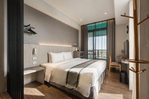 Postel nebo postele na pokoji v ubytování Hotel YAM LAGOM + 32 fotografií