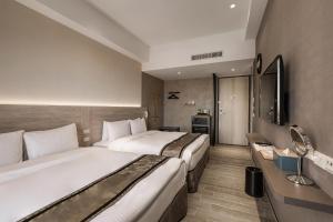 Postel nebo postele na pokoji v ubytování Hotel YAM LAGOM
