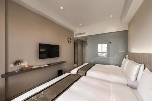 TV a/nebo společenská místnost v ubytování Hotel YAM LAGOM