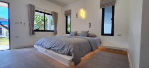 Postel nebo postele na pokoji v ubytování IBIZA BEACH Resort