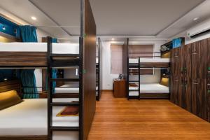 Voodi või voodid majutusasutuse Catba Backpackers - Sea Vibe Pool Bar & Bungalow toas