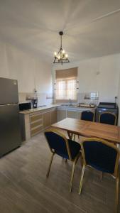 Køkken eller tekøkken på Paradise Coastline Lodge