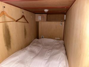Letto o letti in una camera di WGJ Hostel