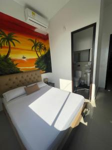 Postel nebo postele na pokoji v ubytování Hotel Hernández CTG