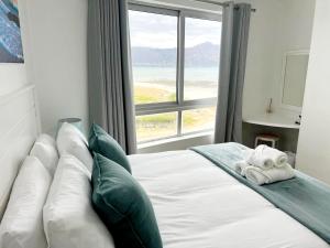 Ένα ή περισσότερα κρεβάτια σε δωμάτιο στο Sunset Accommodation