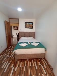 Postel nebo postele na pokoji v ubytování Templo Home